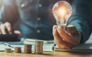 man holding lightbulb - great idea